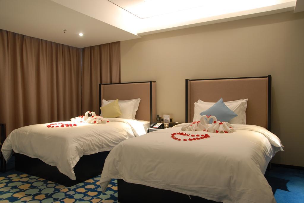 Insail Hotels Zhujiang New Town Jinan University Branch Kanton Zimmer foto