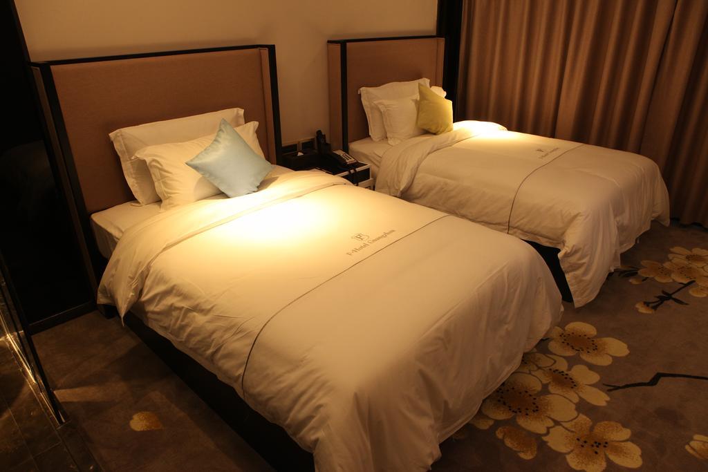 Insail Hotels Zhujiang New Town Jinan University Branch Kanton Zimmer foto